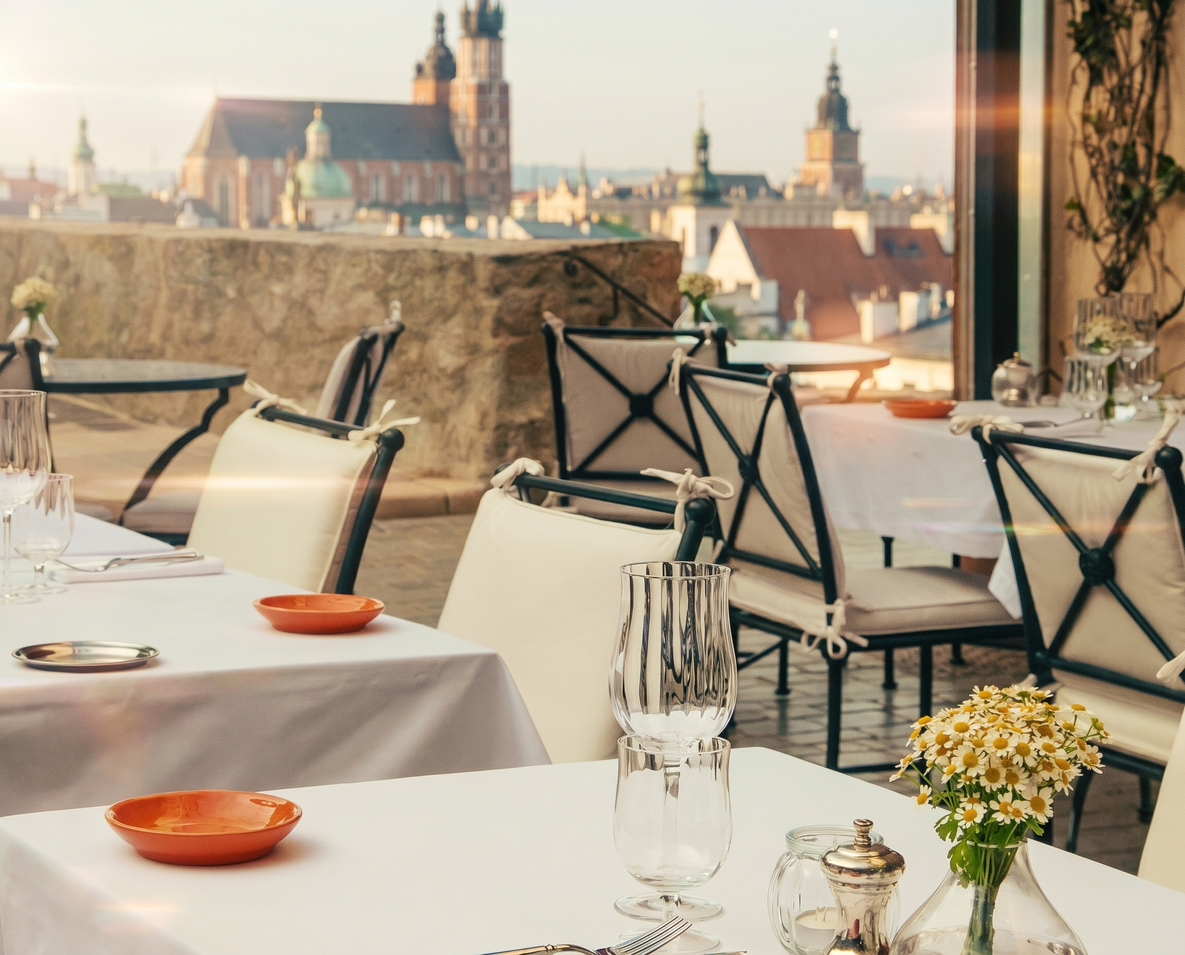 Rooftop dining terrace overlooking Kraków's Old Town