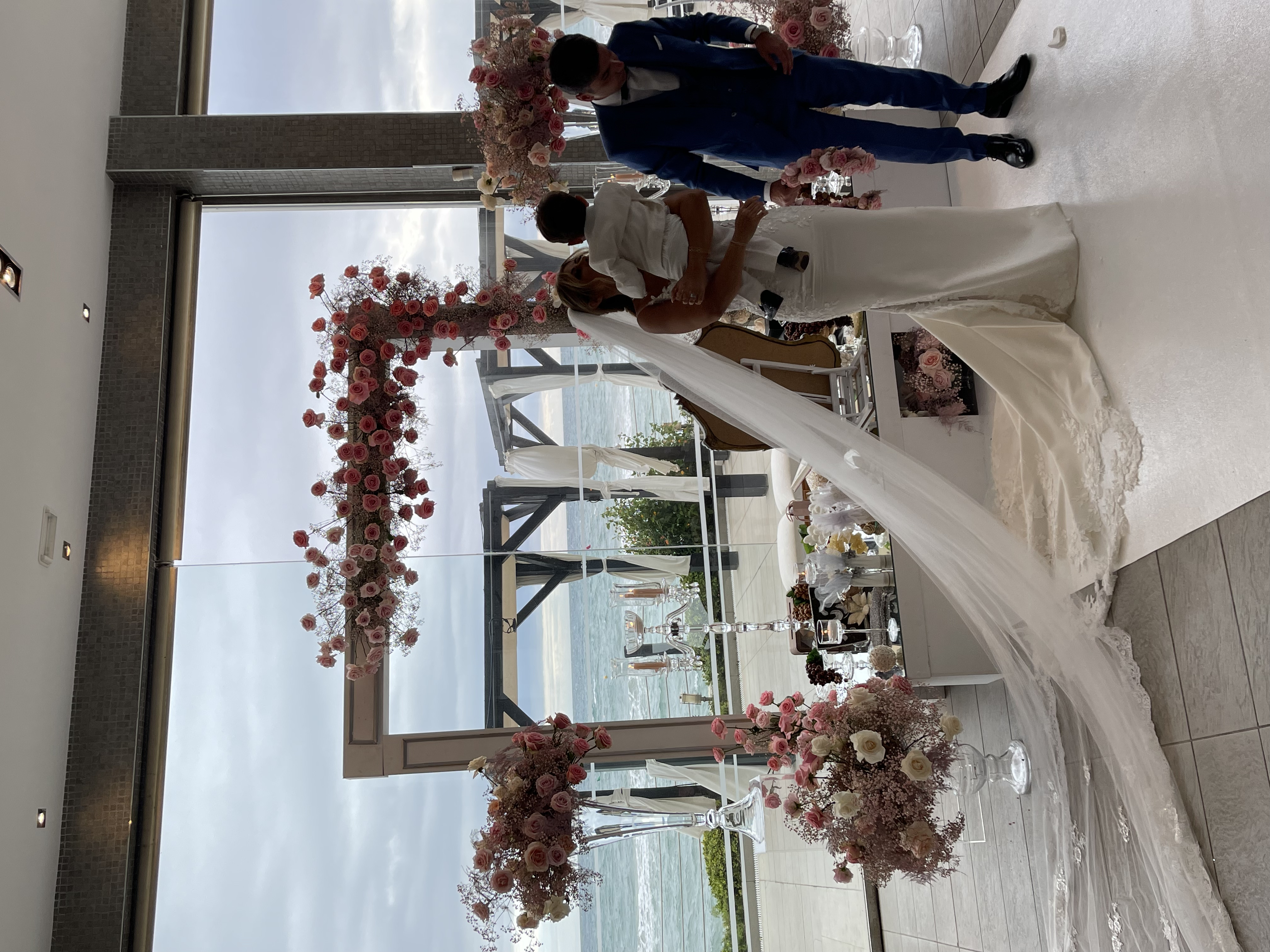Bride and groom at a beachfront wedding ceremony in Marbella